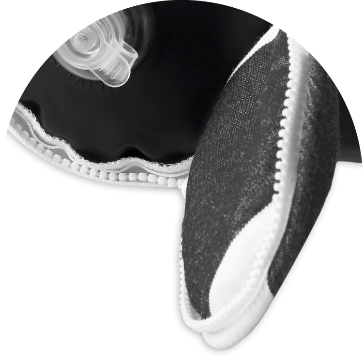 The zippers on a luxury black and white pool float.