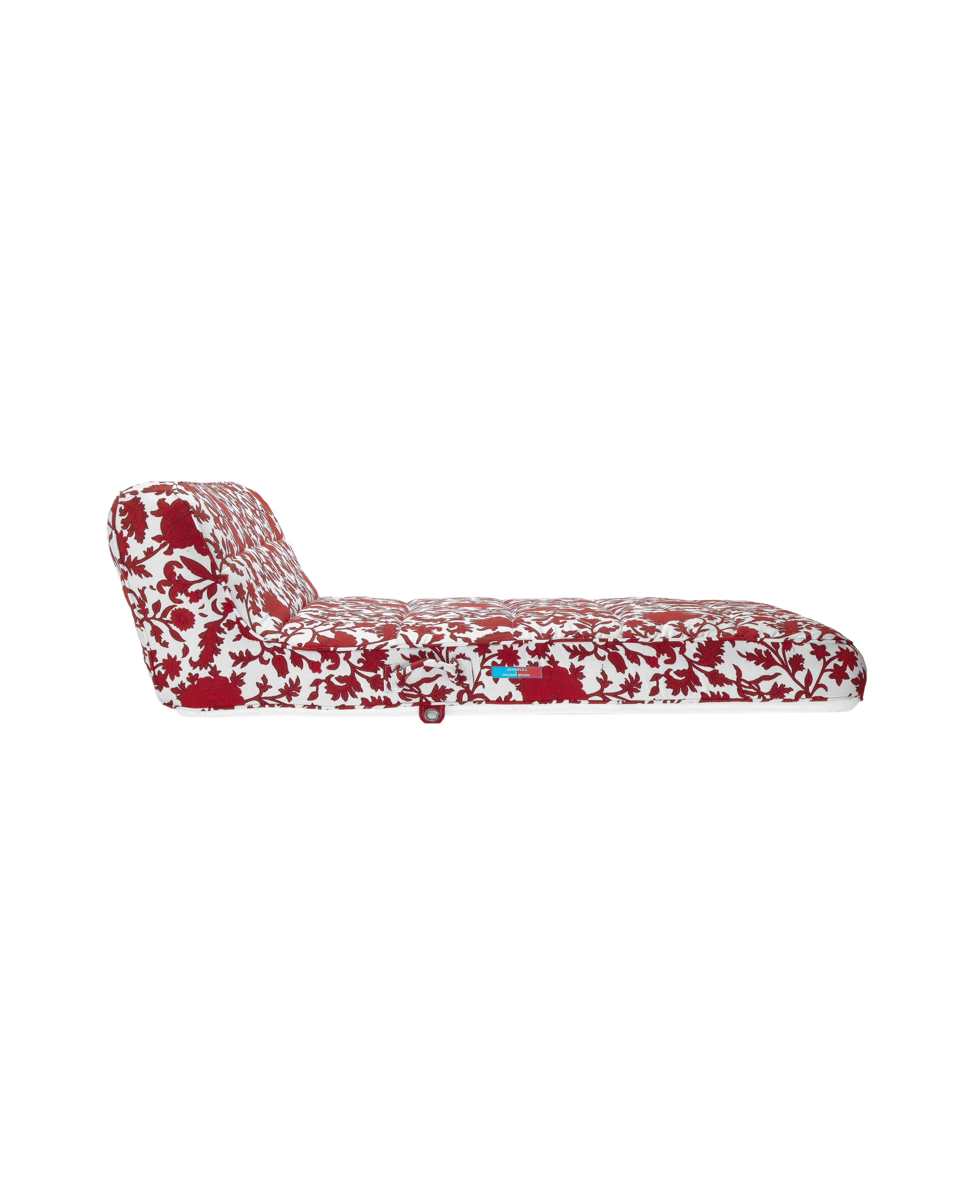 Side view of a premium inflatable pool float with ergonomic backrest and red and white flower jacquard fabric, showcasing the Oliver James logo tag.