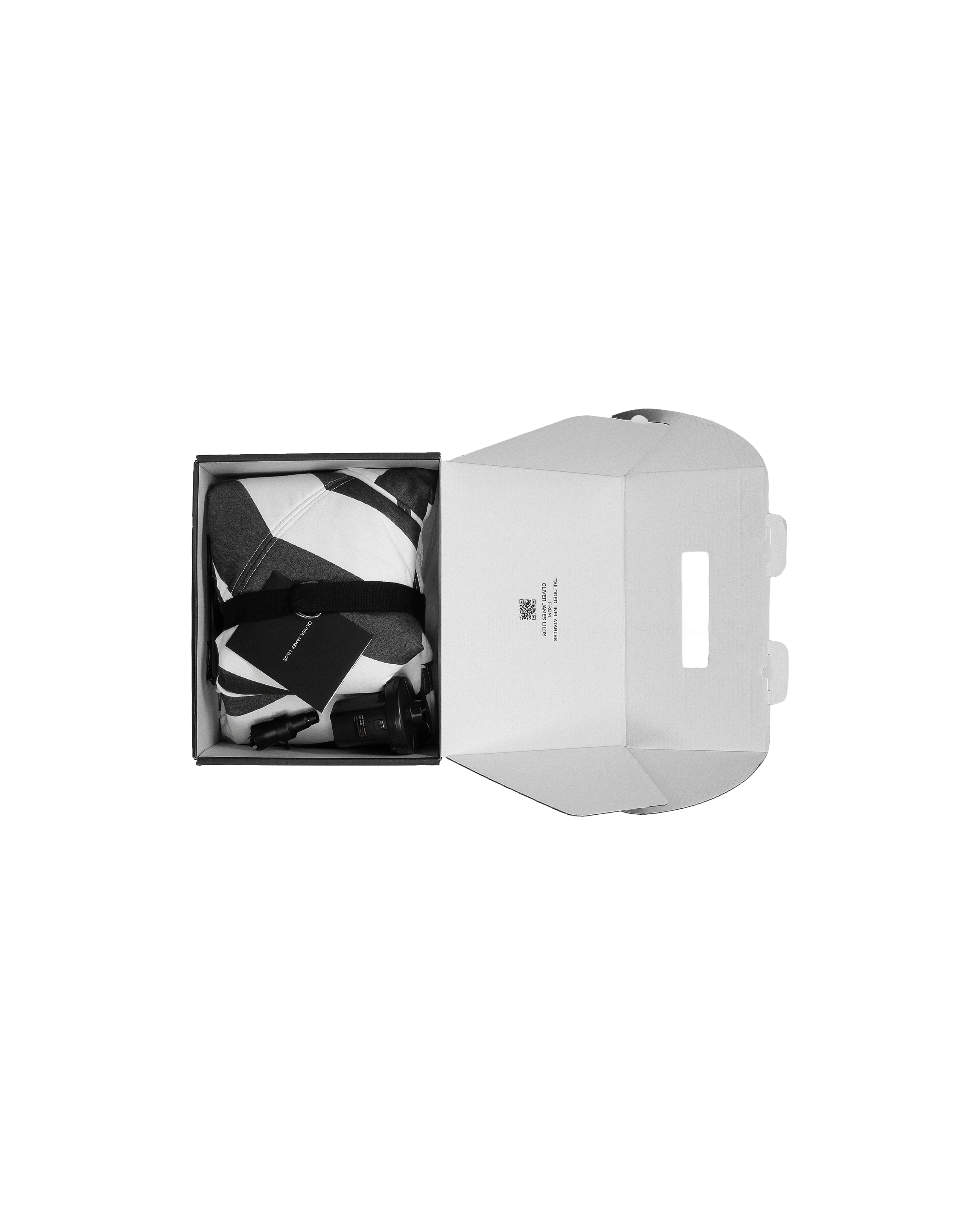 Unboxing of the round designer pool float, folded with branded ribbon in a matte black box, complete with electric pump and instructions.