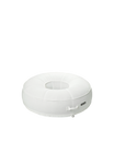 Angle view of a luxury round inflatable pool float with white Chenille fabric, featuring an open center and tailored upholstered finish.
