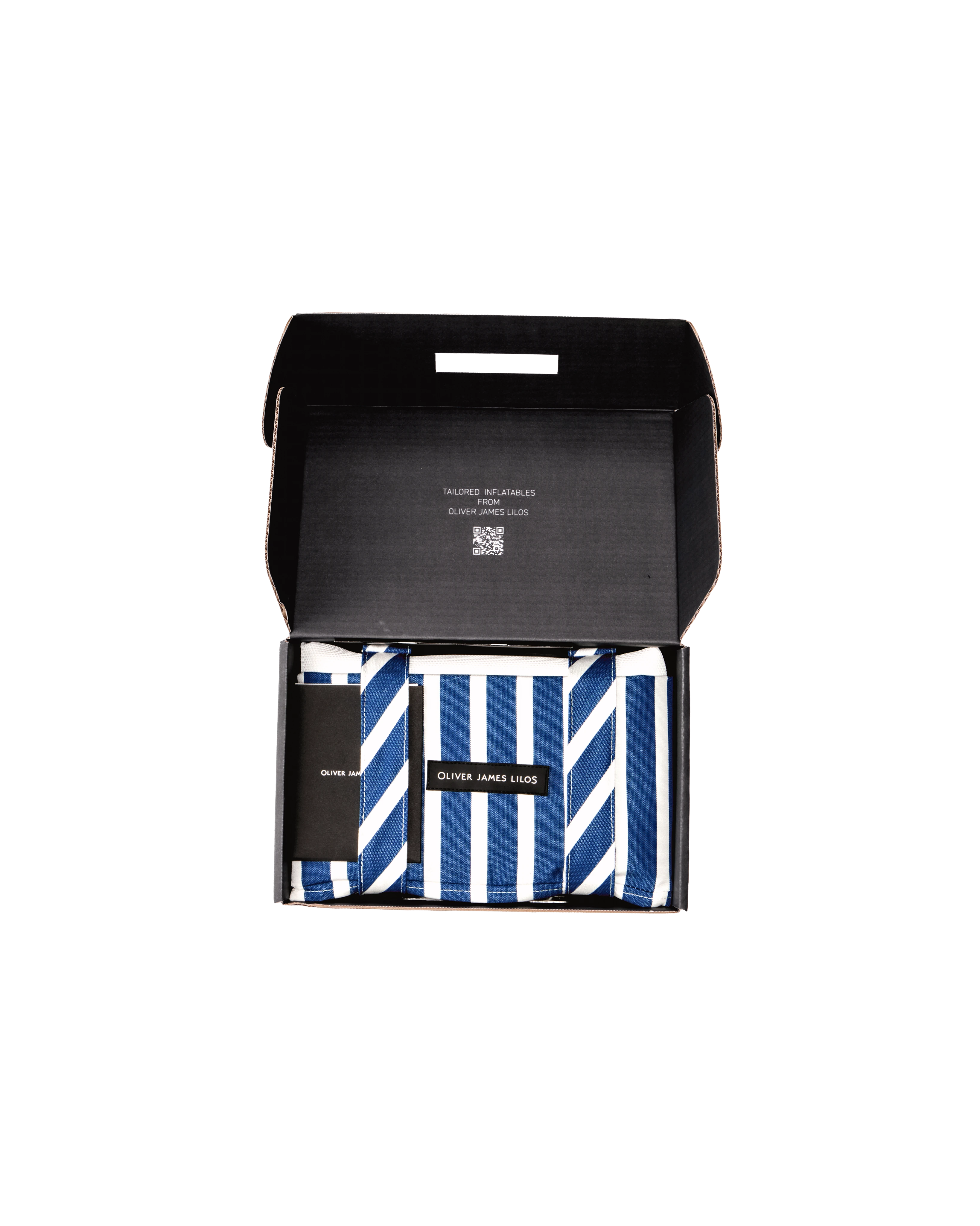 Oliver James floating hammock packed inside a sleek black box, with folded striped bolsters and branded tag — a premium pool float presented with care.