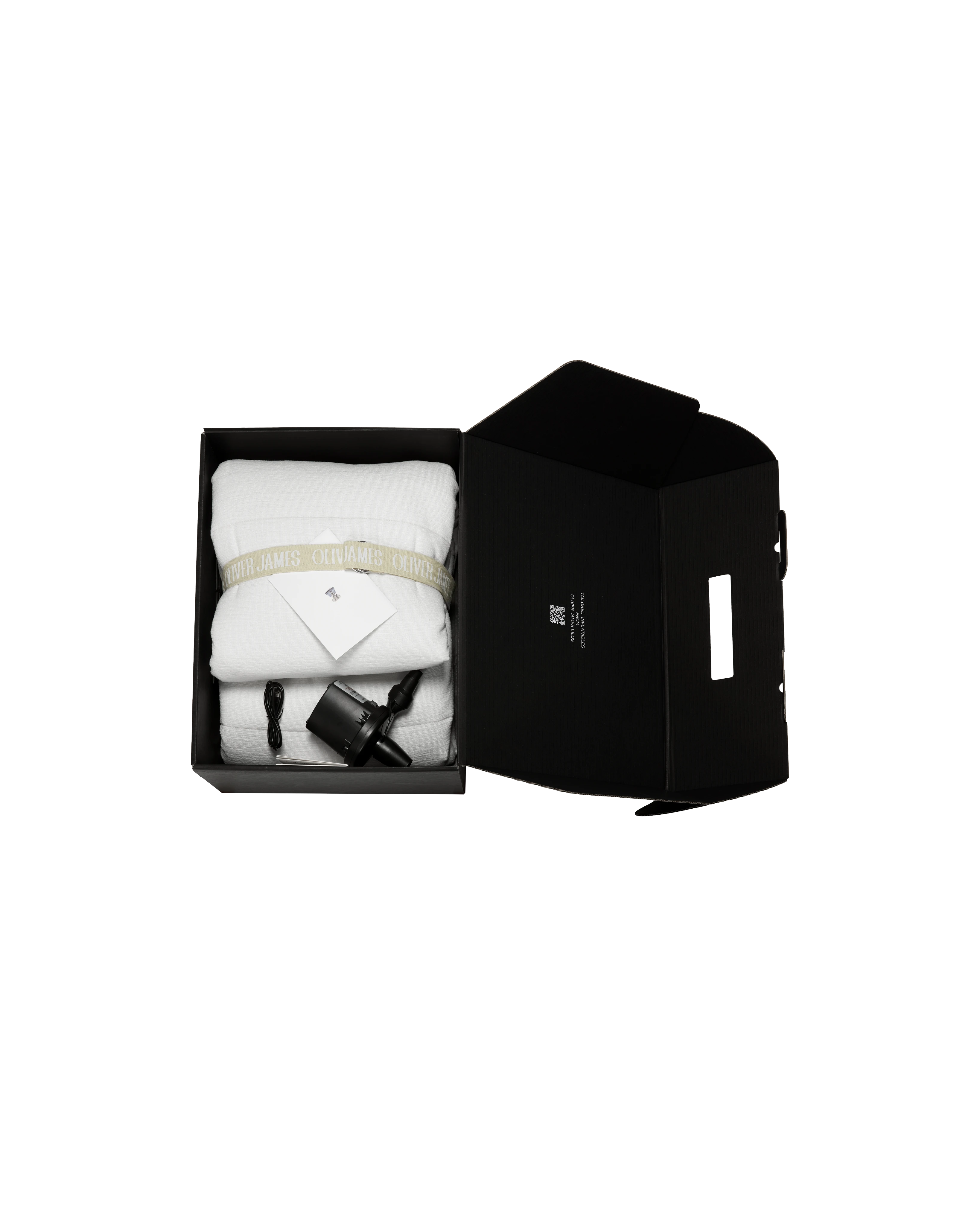 Unboxing of the round designer pool float, folded with branded ribbon in a matte black box, complete with electric pump and instructions.